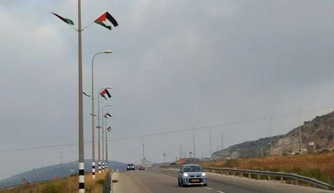 اعلام فلسطين ترفرف على طريق 60 الالتفافي اعلام فلسطين ترفرف على طريق 60 الالتفافي