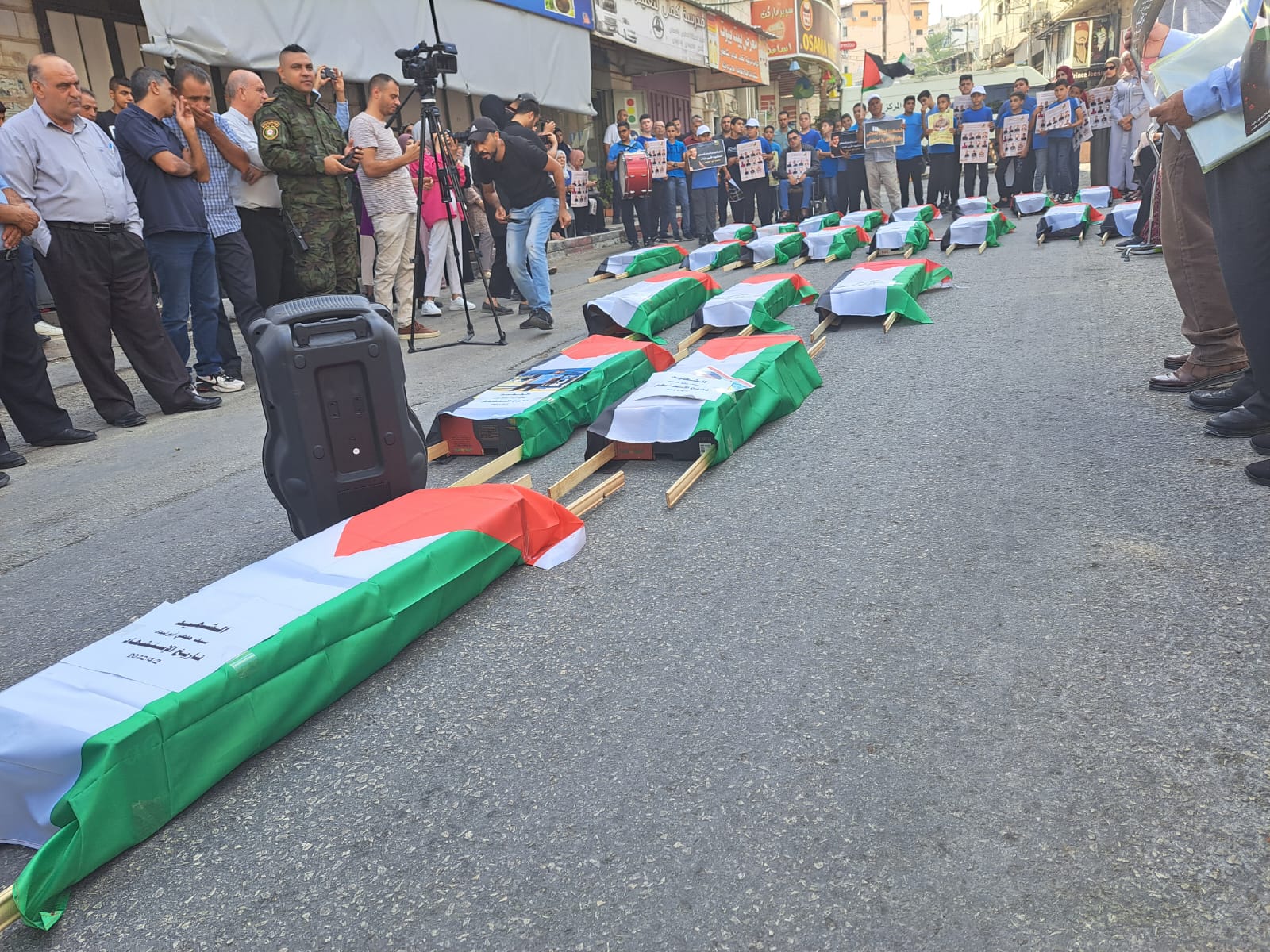 النضال الشعبي تشارك في إحياء اليوم الوطني لاسترداد جثامين الشهداء بمحافظات الضفة الغربية النضال الشعبي تشارك في إحياء اليوم الوطني لاسترداد جثامين الشهداء بمحافظات الضفة الغربية